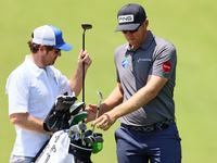 Seamus Power of Waterford, Ireland chips exchanges clubs at the 17th green during the first round of the The Memorial Tournament presented b...