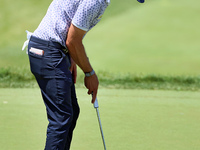 Lanto Griffin of Jacksonville Beach, Florida lines up his putt on the 18th green during the first round of the The Memorial Tournament prese...