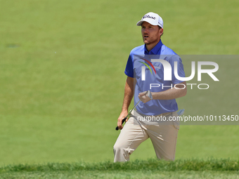 Russell Henley of Columbus, Georgia walks up to the 18th green during the first round of the The Memorial Tournament presented by Workday at...