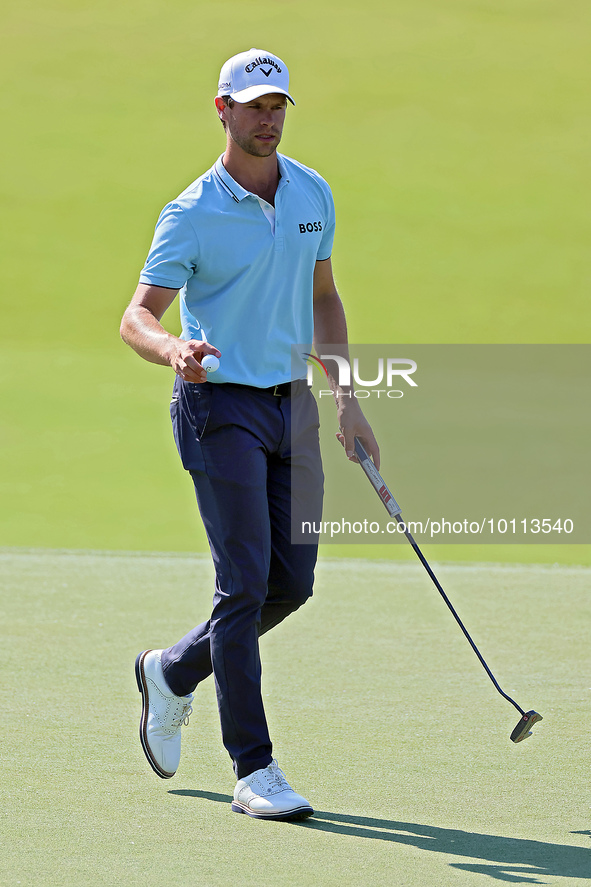 Thomas Detry of Brussels, Belgium walks off the 18th green during the first round of the The Memorial Tournament presented by Workday at Mui...