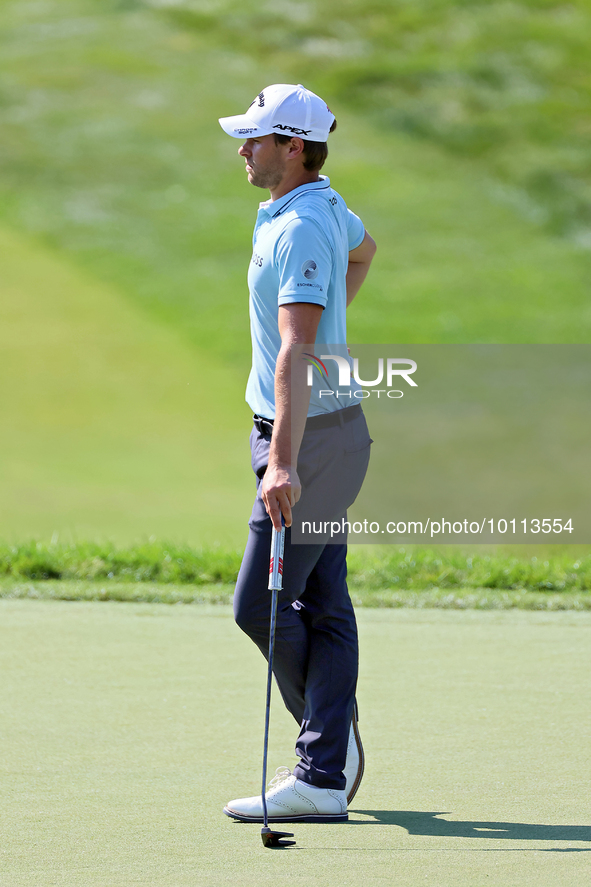 Thomas Detry of Brussels, Belgium waits on the 18th green during the first round of the The Memorial Tournament presented by Workday at Muir...