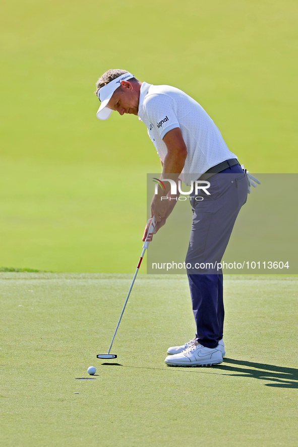 Luke Donald of England putts on the 18th green during the first round of the The Memorial Tournament presented by Workday at Muirfield Villa...