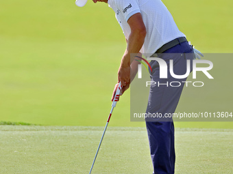 Luke Donald of England putts on the 18th green during the first round of the The Memorial Tournament presented by Workday at Muirfield Villa...