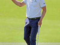 Luke Donald of England acknowledges the crowd after putting on the 18th green during the first round of the The Memorial Tournament presente...