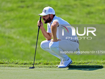 Stephan Jaeger of Germany lines up his putt on the 18th green during the first round of the The Memorial Tournament presented by Workday at...