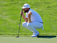 Stephan Jaeger of Germany lines up his putt on the 18th green during the first round of the The Memorial Tournament presented by Workday at...