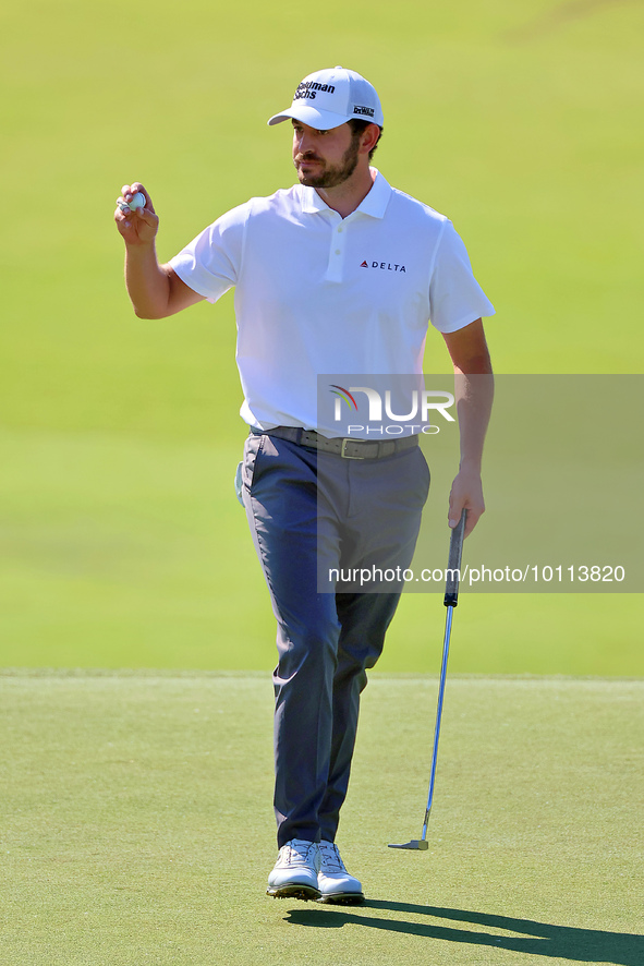 Patrick Cantlay of Jupiter, Florida acknowledges the fans after putting on the 18th green during the first round of the The Memorial Tournam...