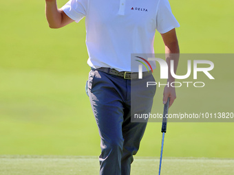 Patrick Cantlay of Jupiter, Florida acknowledges the fans after putting on the 18th green during the first round of the The Memorial Tournam...