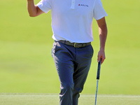 Patrick Cantlay of Jupiter, Florida acknowledges the fans after putting on the 18th green during the first round of the The Memorial Tournam...