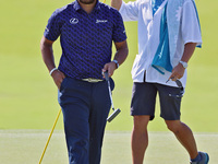 HIdeki Matsuyama of Sendai, Japan walks on the 18th green during the first round of the The Memorial Tournament presented by Workday at Muir...