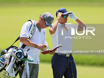 Rickie Fowler of Murrieta California looks down the 5th fairway during The Memorial Tournament presented by Workday at Muirfield Village Gol...