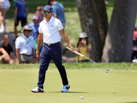 Rickie Fowler of Murrieta California reacts after putting on the 5th green during The Memorial Tournament presented by Workday at Muirfield...