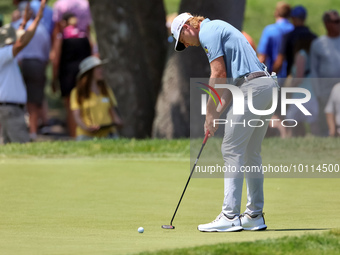 Sam Burns of Shreveport, Louisiana putts on the 5th green during The Memorial Tournament presented by Workday at Muirfield Village Golf Club...