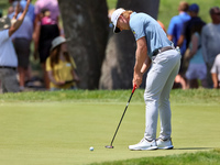 Sam Burns of Shreveport, Louisiana putts on the 5th green during The Memorial Tournament presented by Workday at Muirfield Village Golf Club...