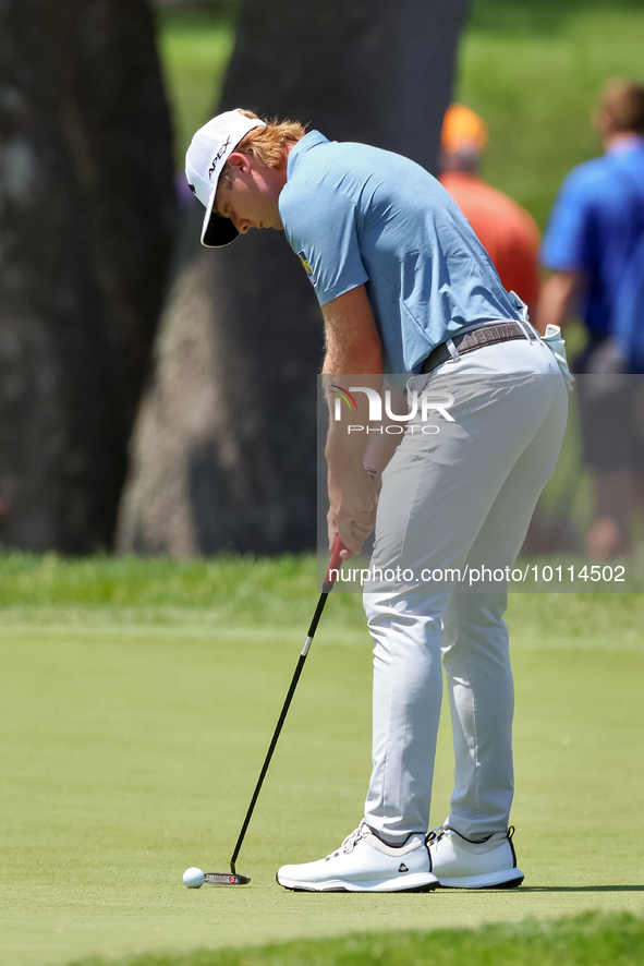 Sam Burns of Shreveport, Louisiana putts on the 5th green during The Memorial Tournament presented by Workday at Muirfield Village Golf Club...