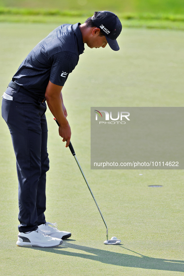 Justin Suh of San Jose, California putts on the 18th green during the second round during  The Memorial Tournament presented by Workday at M...