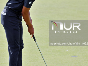 Justin Suh of San Jose, California putts on the 18th green during the second round during  The Memorial Tournament presented by Workday at M...