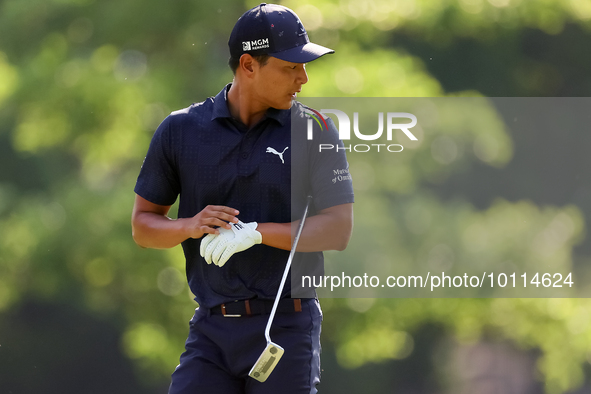 Justin Suh of San Jose, California walks to the 18th green after hitting from the fairway the  second round during  The Memorial Tournament...