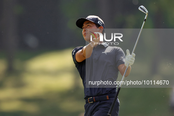 Justin Suh of San Jose, California hits from the 18th fairway during the second round during  The Memorial Tournament presented by Workday a...