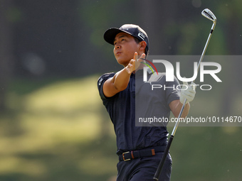 Justin Suh of San Jose, California hits from the 18th fairway during the second round during  The Memorial Tournament presented by Workday a...