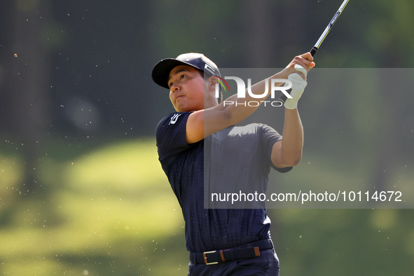 Justin Suh of San Jose, California hits from the 18th fairway during the second round during  The Memorial Tournament presented by Workday a...