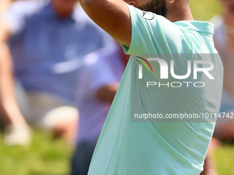 John Rahm of Barrika, Spain reacts after making his putt on the 9th green during  The Memorial Tournament presented by Workday at Muirfield...