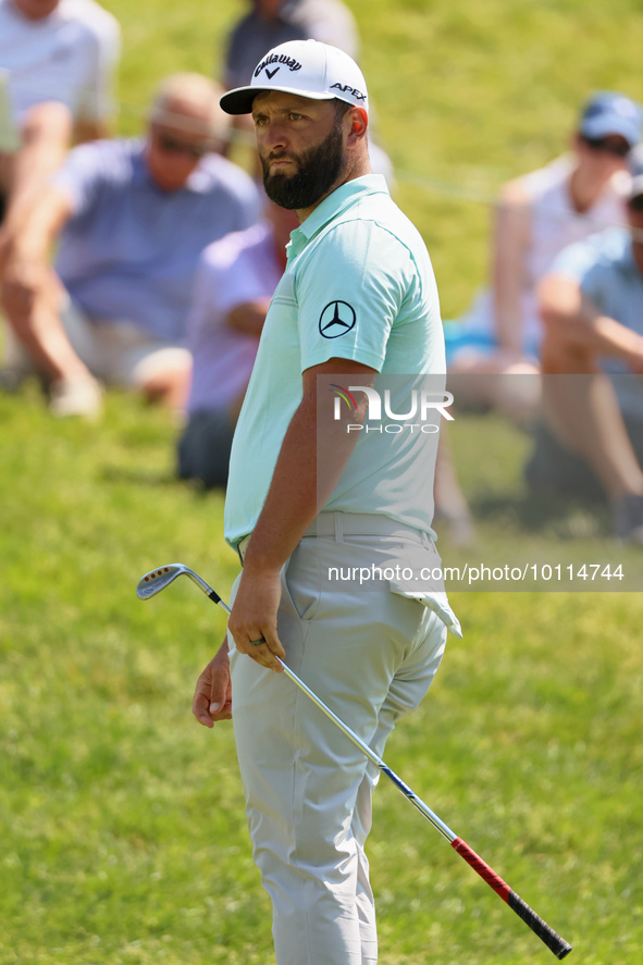 John Rahm of Barrika, Spain follows his putt on the 9th green during  The Memorial Tournament presented by Workday at Muirfield Village Golf...