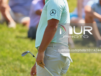 John Rahm of Barrika, Spain follows his putt on the 9th green during  The Memorial Tournament presented by Workday at Muirfield Village Golf...