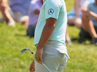 John Rahm of Barrika, Spain follows his putt on the 9th green during  The Memorial Tournament presented by Workday at Muirfield Village Golf...