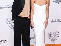 Evan Ross and wife Ashlee Simpson Ross arrive at the 30th Annual Race To Erase MS Gala held at the Fairmont Century Plaza on June 2, 2023 in...