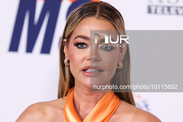 American actress, television personality and former fashion model Denise Richards arrives at the 30th Annual Race To Erase MS Gala held at t...