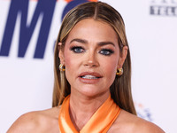 American actress, television personality and former fashion model Denise Richards arrives at the 30th Annual Race To Erase MS Gala held at t...