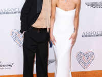 Evan Ross and wife Ashlee Simpson Ross arrive at the 30th Annual Race To Erase MS Gala held at the Fairmont Century Plaza on June 2, 2023 in...