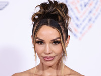 American television personality, actress and singer Scheana Shay arrives at the 30th Annual Race To Erase MS Gala held at the Fairmont Centu...