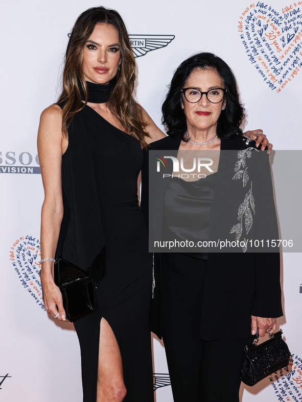 Alessandra Ambrosio and mother Lucilda Ambrosio arrive at the 30th Annual Race To Erase MS Gala held at the Fairmont Century Plaza on June 2...