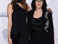 Alessandra Ambrosio and mother Lucilda Ambrosio arrive at the 30th Annual Race To Erase MS Gala held at the Fairmont Century Plaza on June 2...