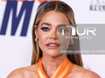 American actress, television personality and former fashion model Denise Richards arrives at the 30th Annual Race To Erase MS Gala held at t...