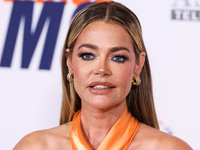 American actress, television personality and former fashion model Denise Richards arrives at the 30th Annual Race To Erase MS Gala held at t...