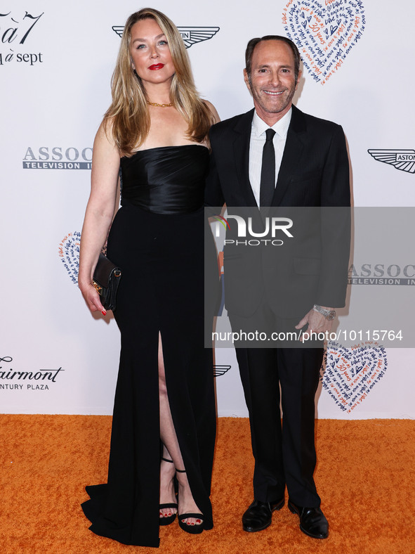 Elisabeth Rohm and husband Peter Glatzer arrive at the 30th Annual Race To Erase MS Gala held at the Fairmont Century Plaza on June 2, 2023...