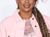 American actress and singer Holly Robinson Peete arrives at the 30th Annual Race To Erase MS Gala held at the Fairmont Century Plaza on June...