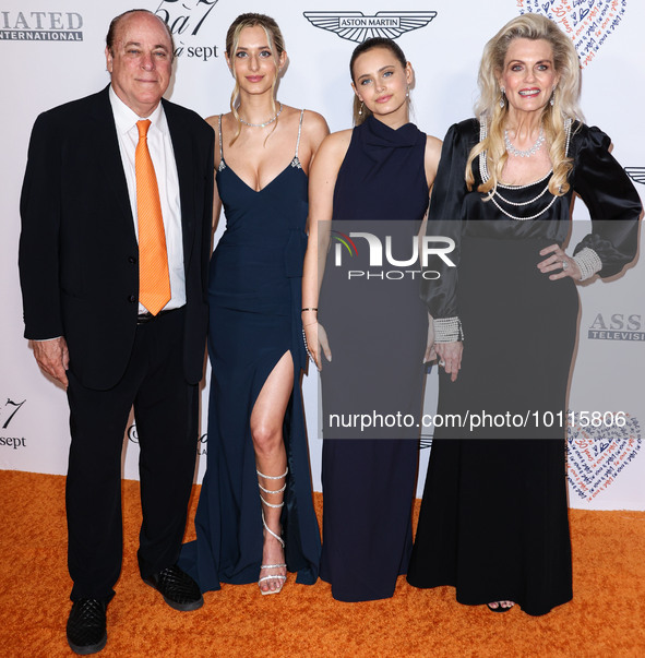 Ken Rickel, Isabella Rickel, Mariella Rickel and Nancy Davis arrive at the 30th Annual Race To Erase MS Gala held at the Fairmont Century Pl...