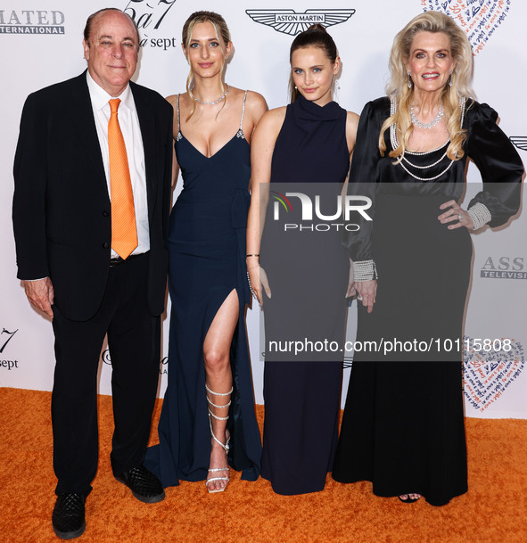 Ken Rickel, Isabella Rickel, Mariella Rickel and Nancy Davis arrive at the 30th Annual Race To Erase MS Gala held at the Fairmont Century Pl...