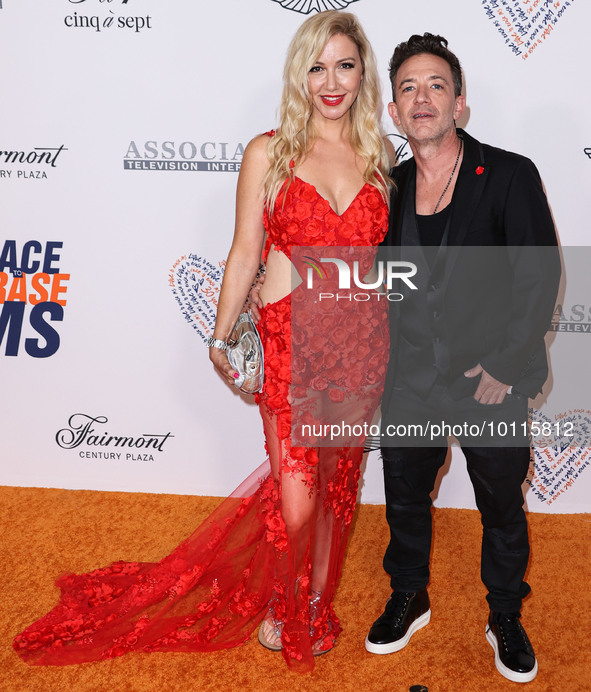 Lindsay Faustino and David Faustino arrive at the 30th Annual Race To Erase MS Gala held at the Fairmont Century Plaza on June 2, 2023 in Ce...