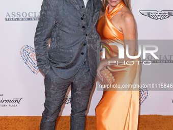 Aaron Phypers and wife Denise Richards arrive at the 30th Annual Race To Erase MS Gala held at the Fairmont Century Plaza on June 2, 2023 in...