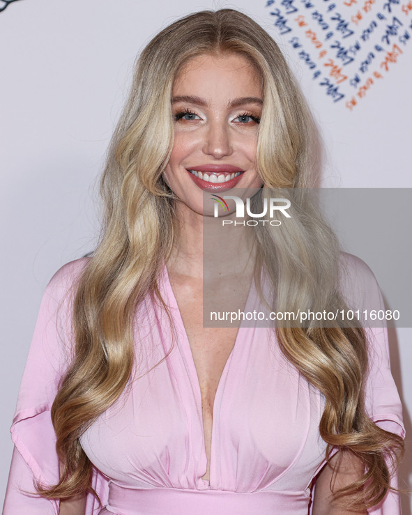 American actress, model and artist Arielle Raycene arrives at the 30th Annual Race To Erase MS Gala held at the Fairmont Century Plaza on Ju...