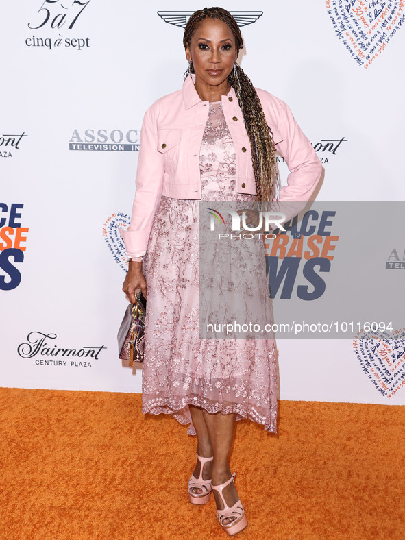 American actress and singer Holly Robinson Peete arrives at the 30th Annual Race To Erase MS Gala held at the Fairmont Century Plaza on June...