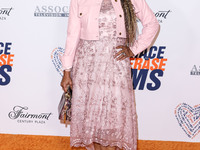 American actress and singer Holly Robinson Peete arrives at the 30th Annual Race To Erase MS Gala held at the Fairmont Century Plaza on June...