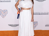 American actress and singer-songwriter Trinity Jo-Li Bliss arrives at the 30th Annual Race To Erase MS Gala held at the Fairmont Century Pla...