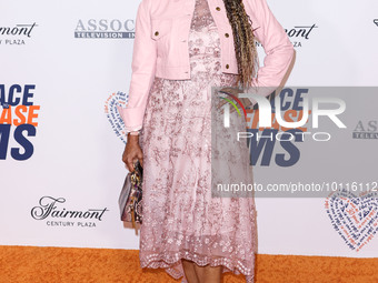 American actress and singer Holly Robinson Peete arrives at the 30th Annual Race To Erase MS Gala held at the Fairmont Century Plaza on June...