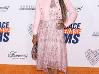 American actress and singer Holly Robinson Peete arrives at the 30th Annual Race To Erase MS Gala held at the Fairmont Century Plaza on June...